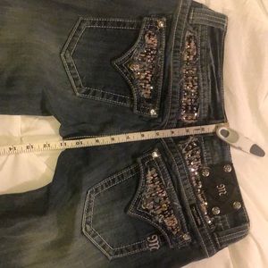 Miss Me Jeans with super cute pink and silver sequin back detail. Size 29